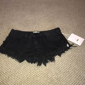 One teaspoon lace up black denim shorts! Size 24
